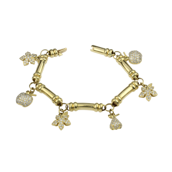Brillantbettelarmband in 750er Gelbgold mit sechs Charms