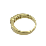 Edler Ring aus 750er Gelbgold mit zentriertem, großem Brillanten umgeben von Baguette Diamanten